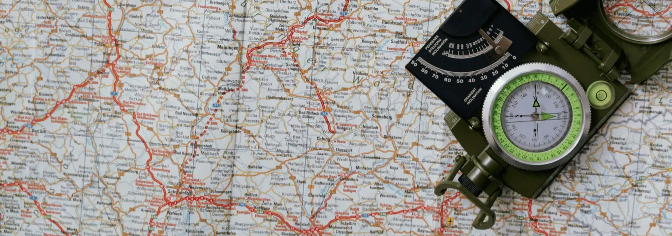 a compass on top of a map