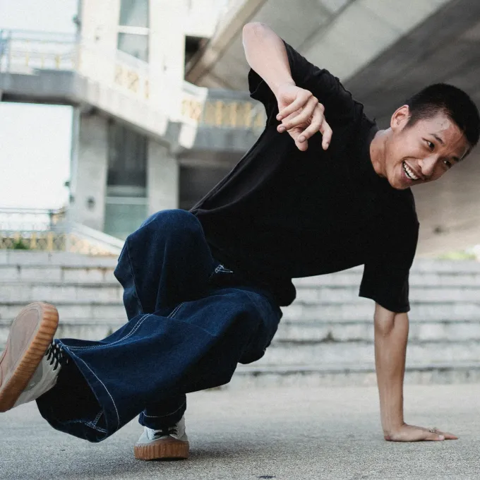 a young man breakdancing