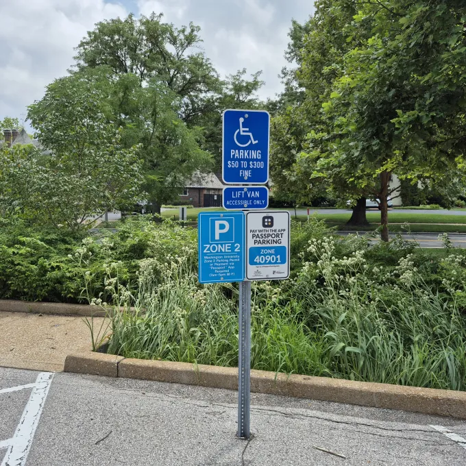 Photo of a parking sign at WashU for an accessible parking space